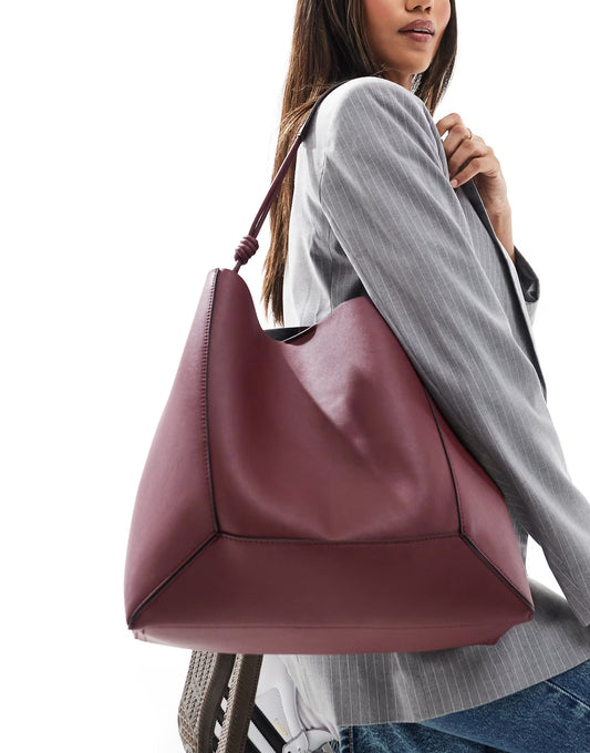 ASOS DESIGN panelled tote bag with knot handle in burgundy