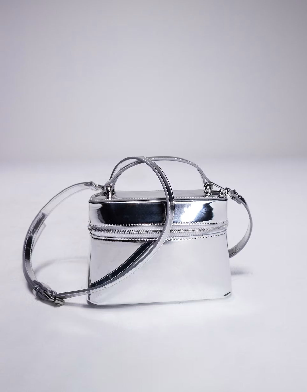 ASOS DESIGN vanity box bag with detachable cross body strap in high shine silver